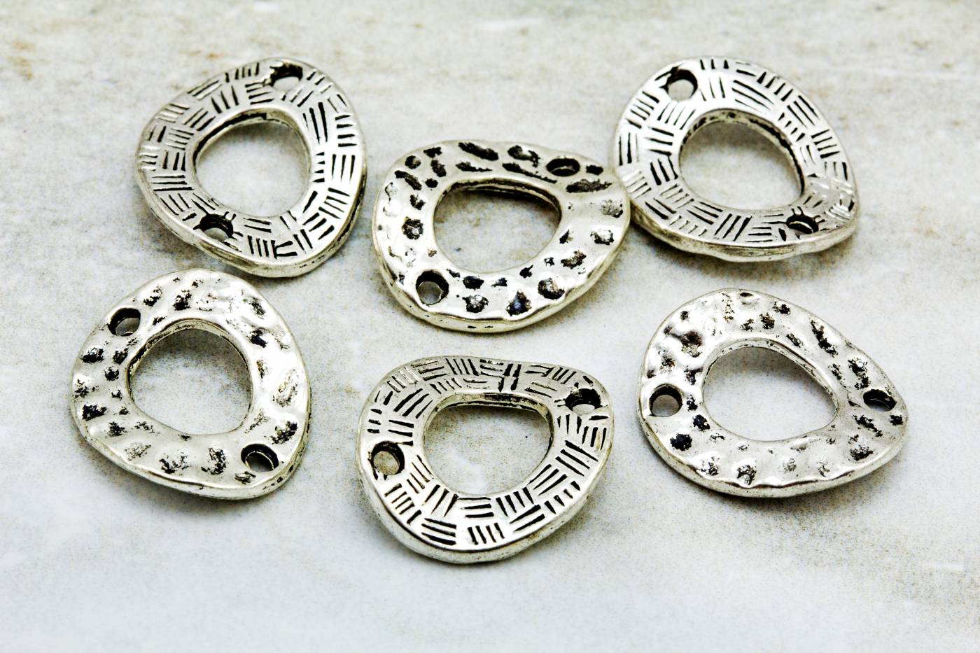 curved-ring-silver-jewelry-charms
