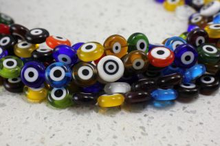 12mm-flat-round-evil-eye-strand-beads