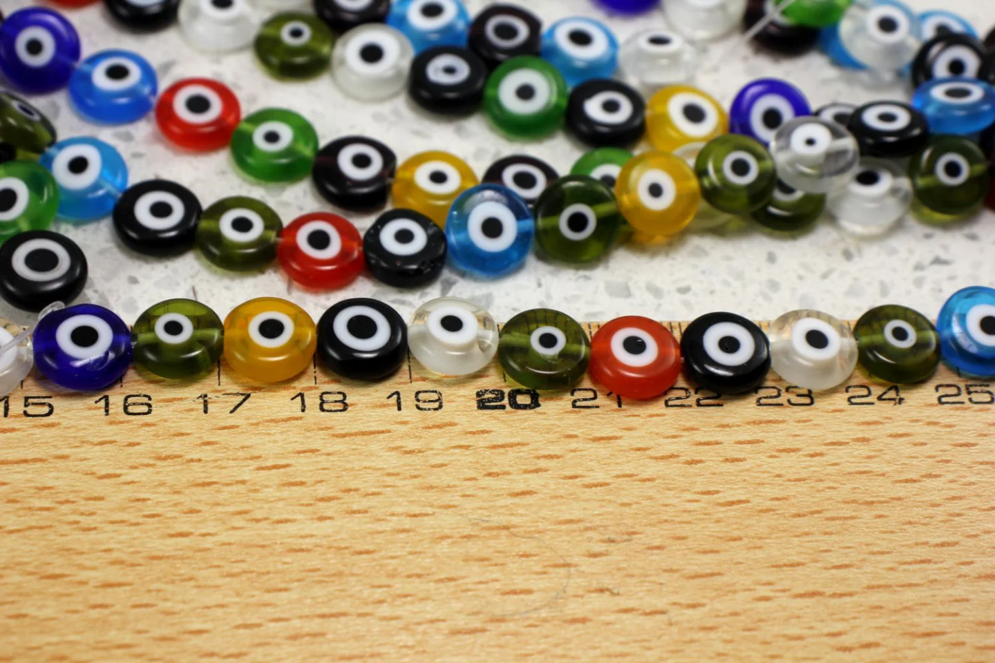 flat-round-evil-eye-beads-strand.