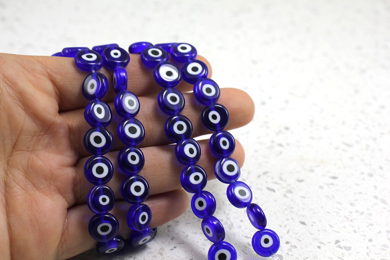 flat-round-evil-eye-beads-strand