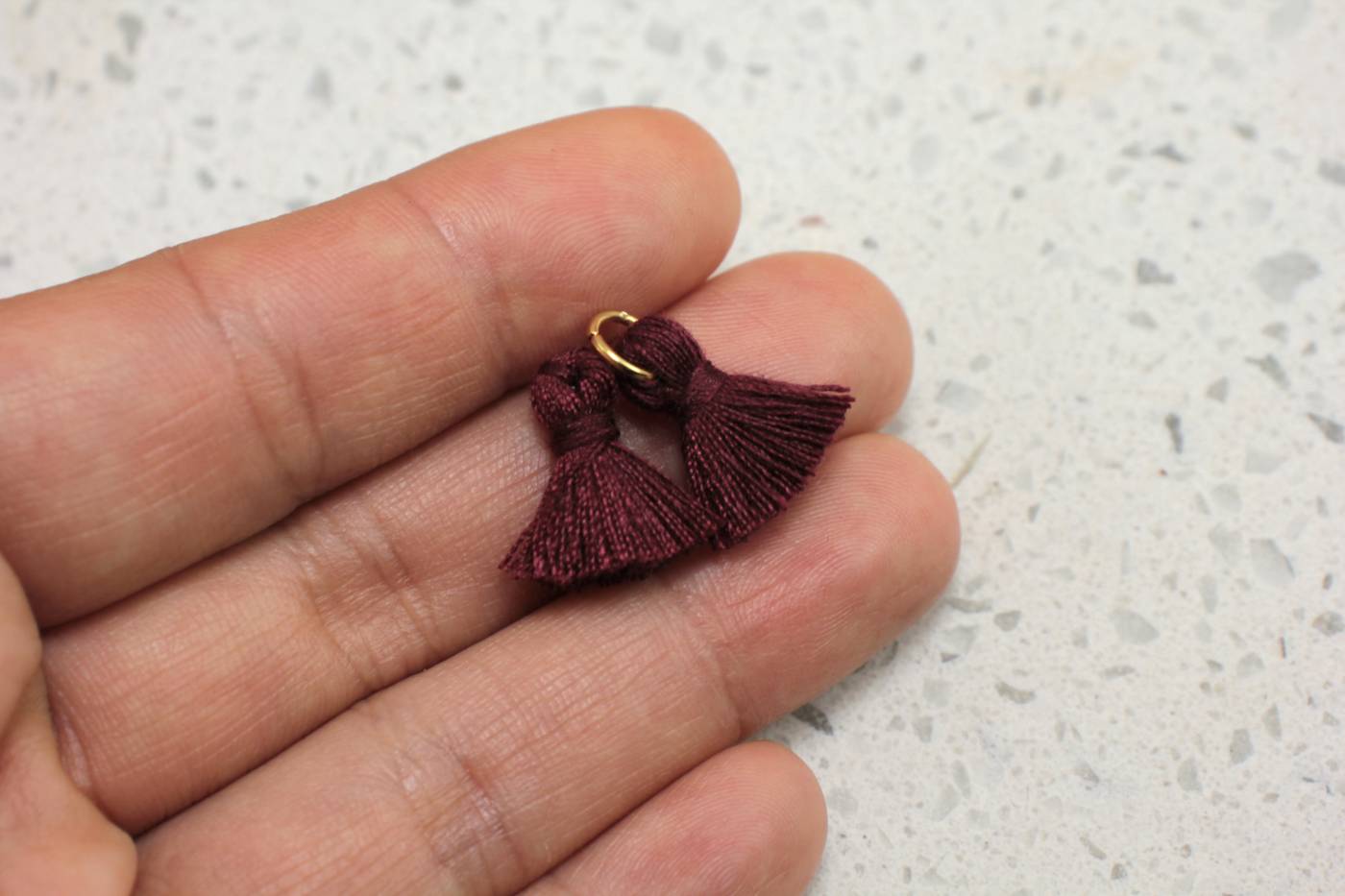 mini-cotton-tassel-with-ring-attached