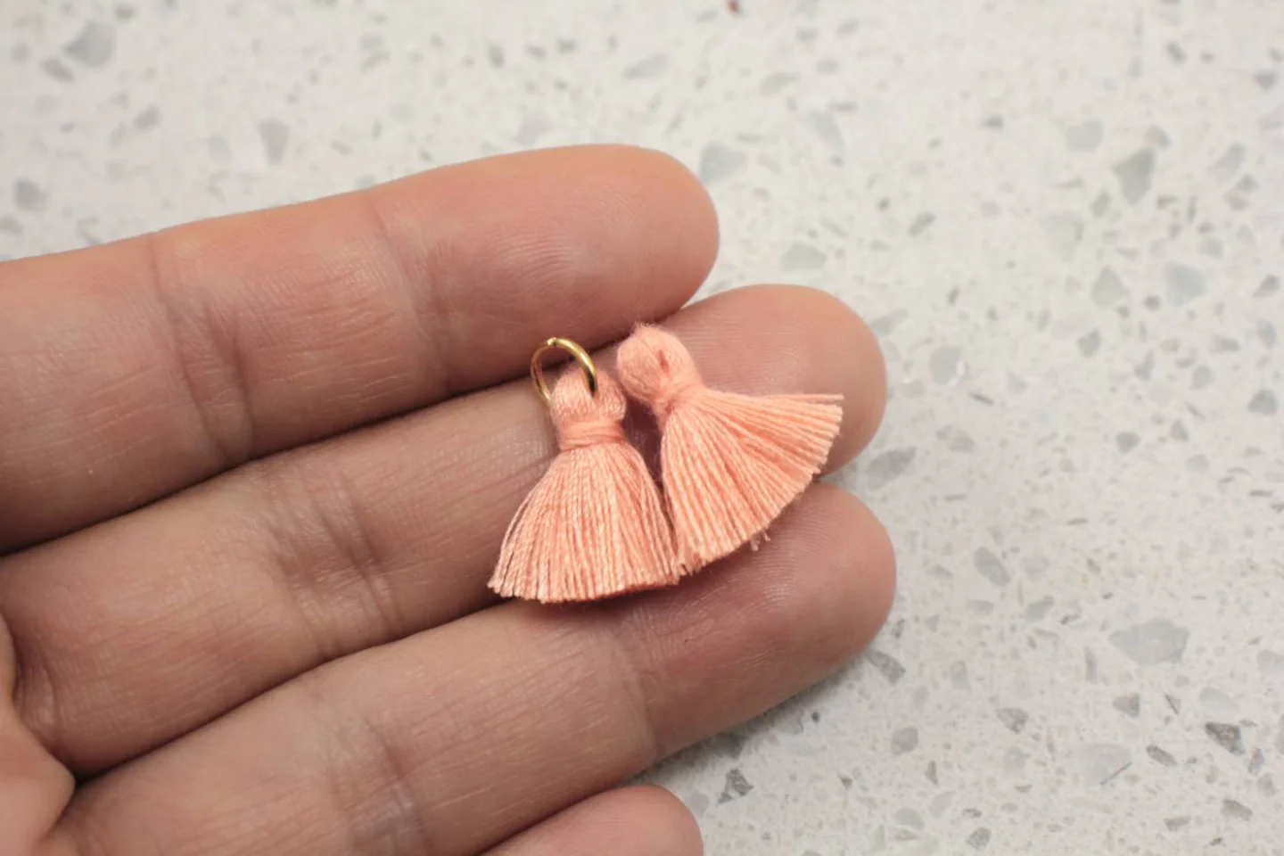 coral-colour-mini-cotton-tassel.