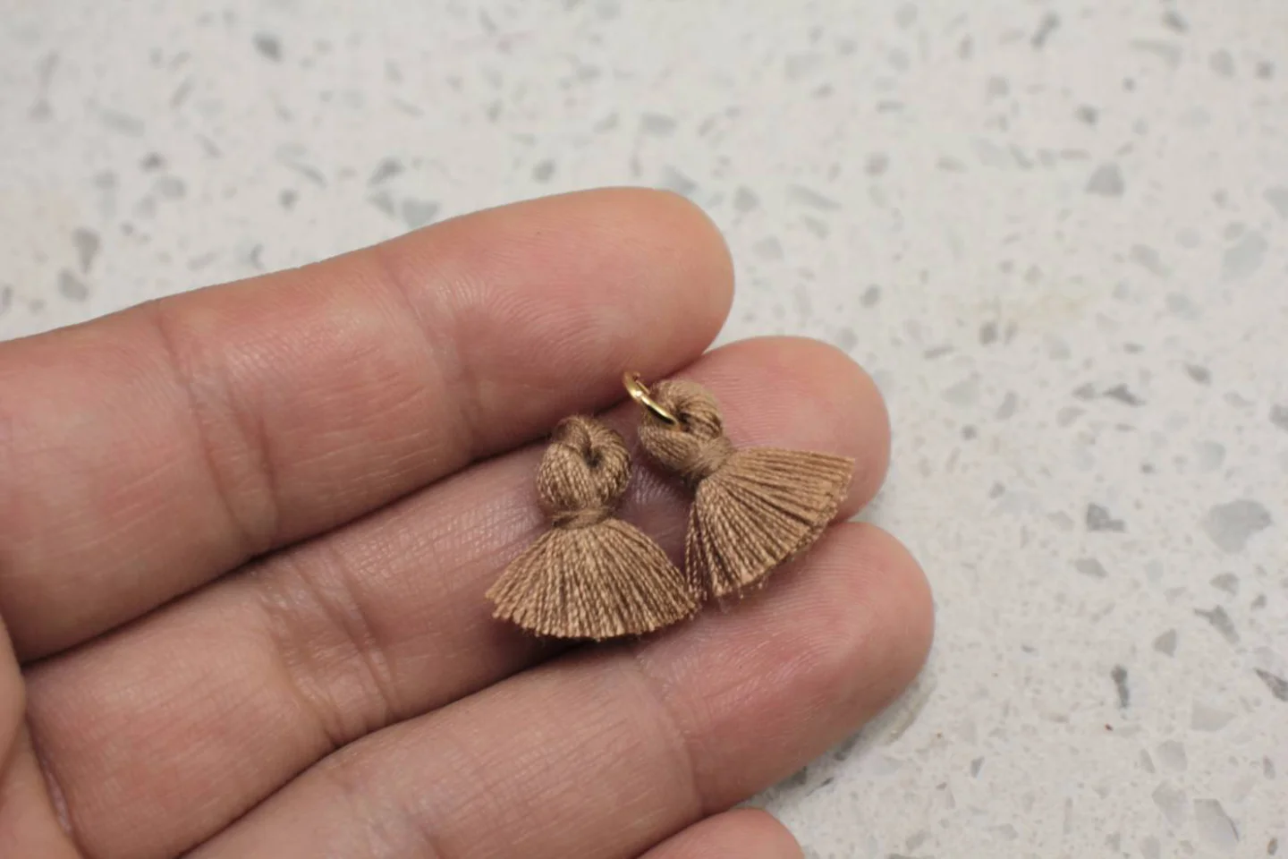 brown-handmade-cotton-mini-tassels.