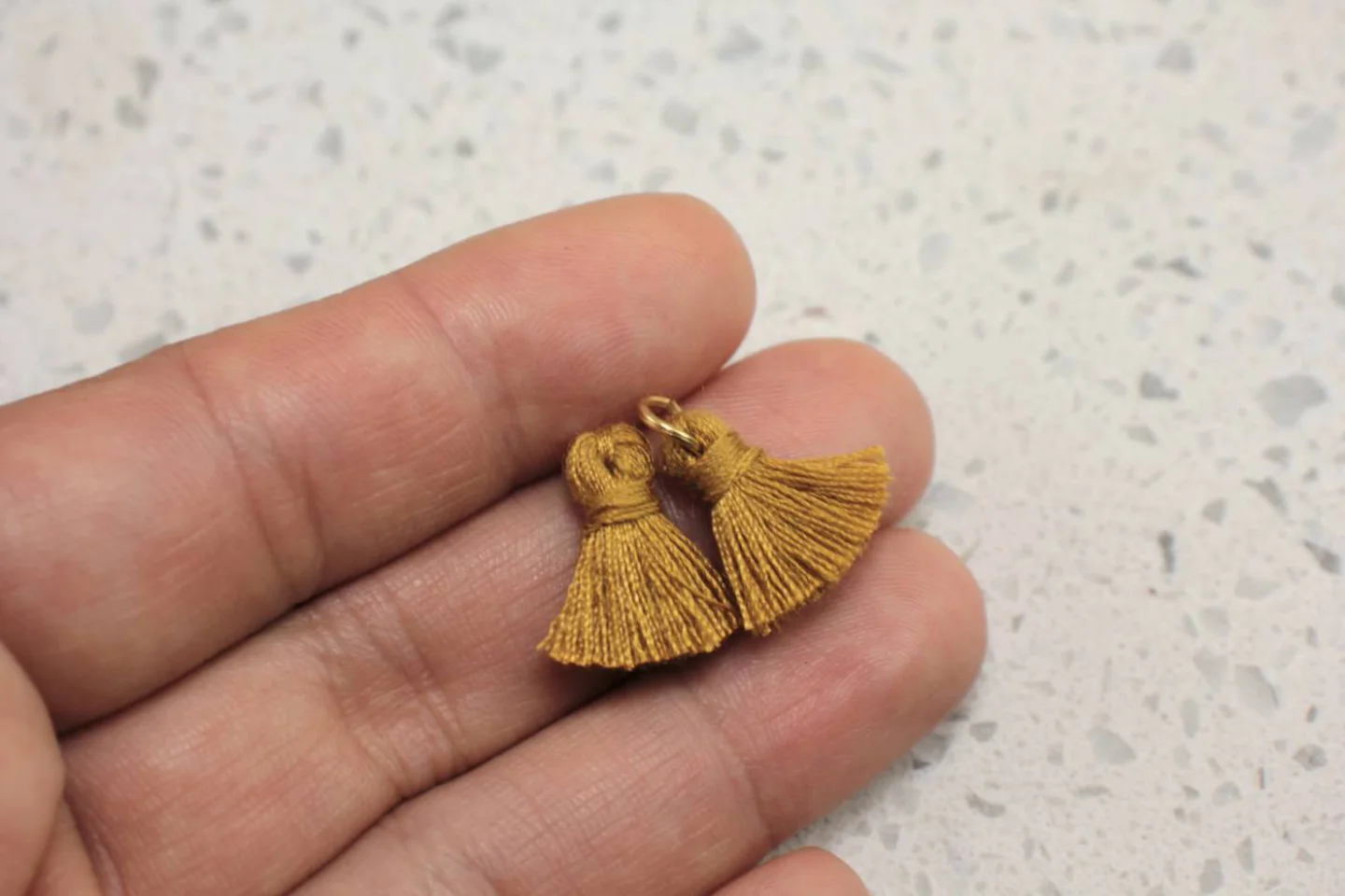 brown-handmade-cotton-mini-tassel.
