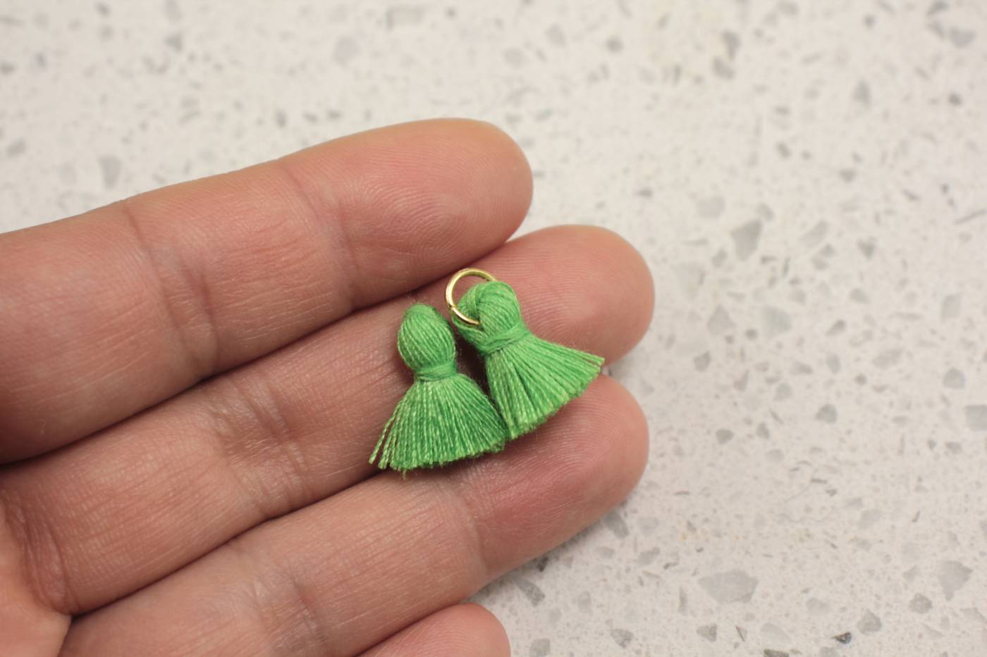 green-mini-cotton-tassel