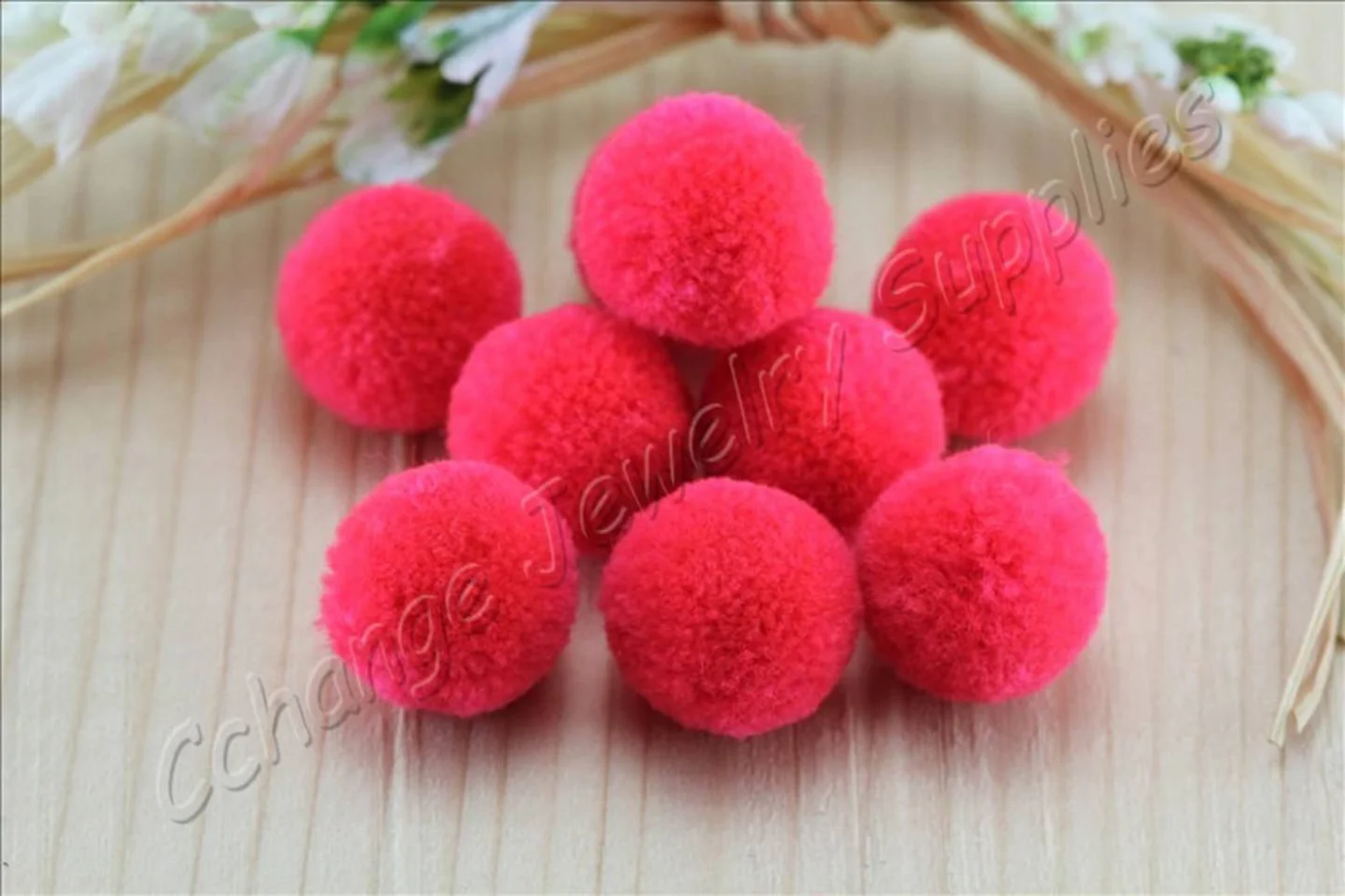 handmade-cotton-pompoms-neon-pink.