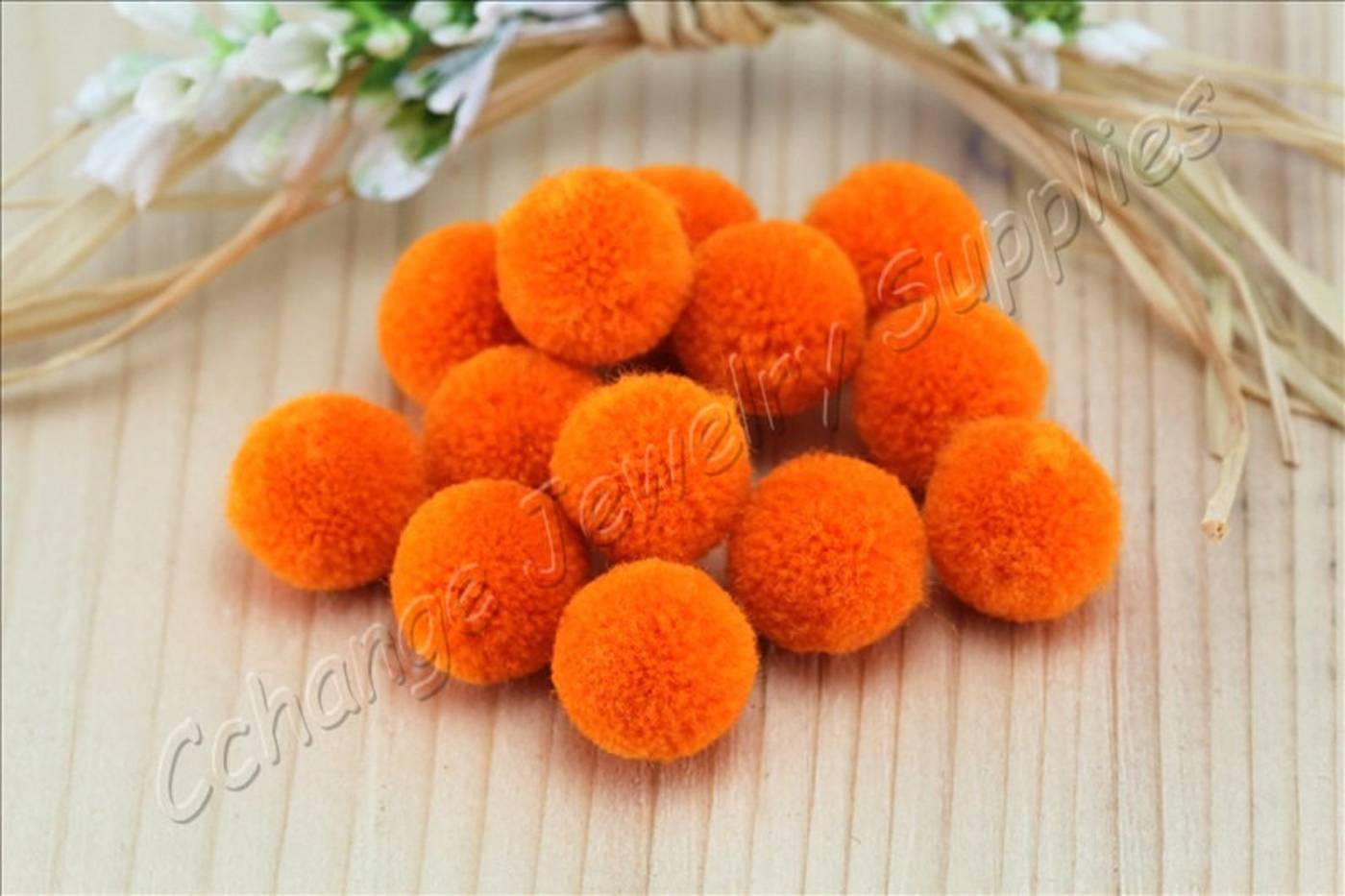 handmade-cotton-pompoms-orange