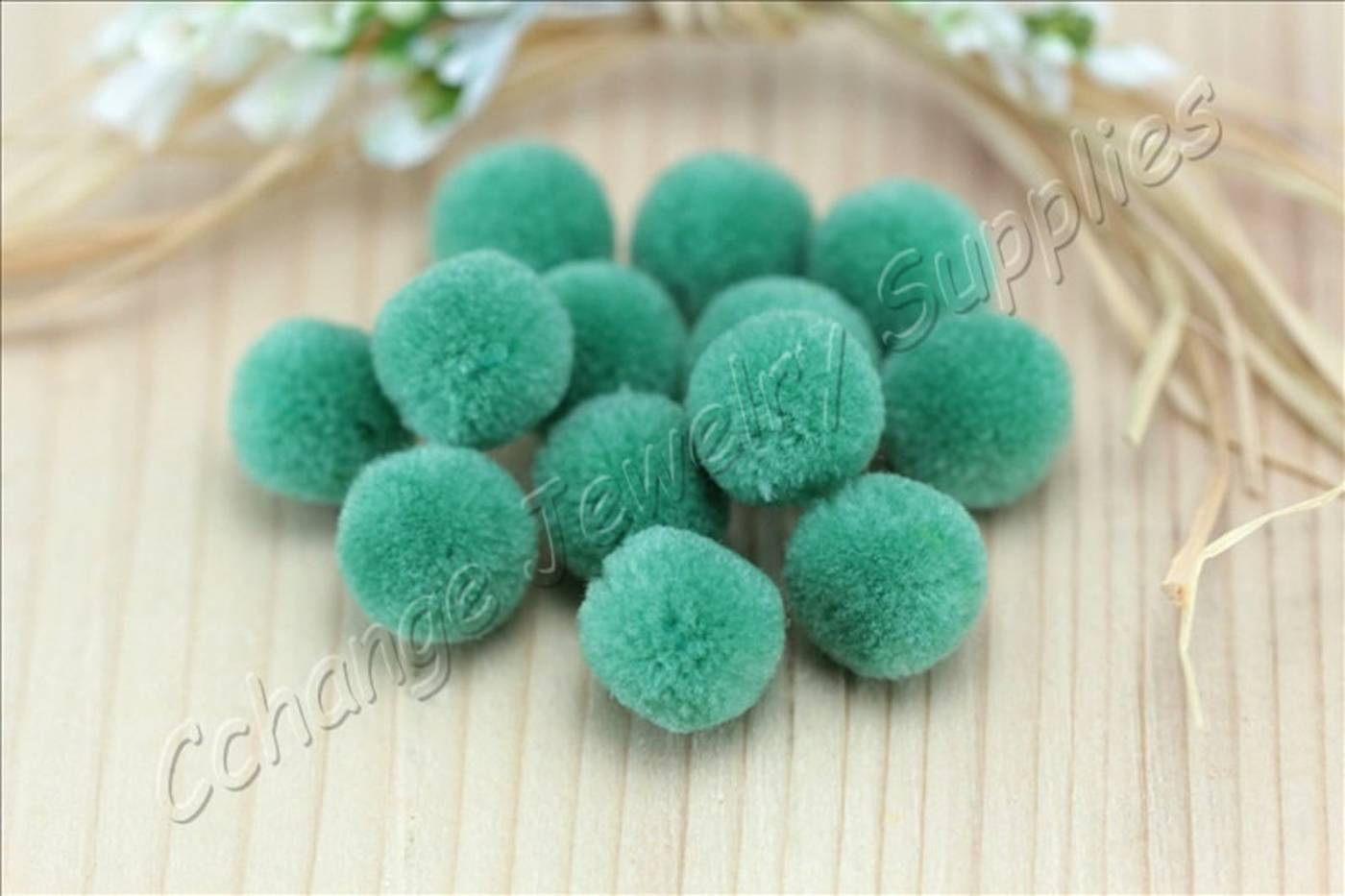 handmade-cotton-pompoms-green