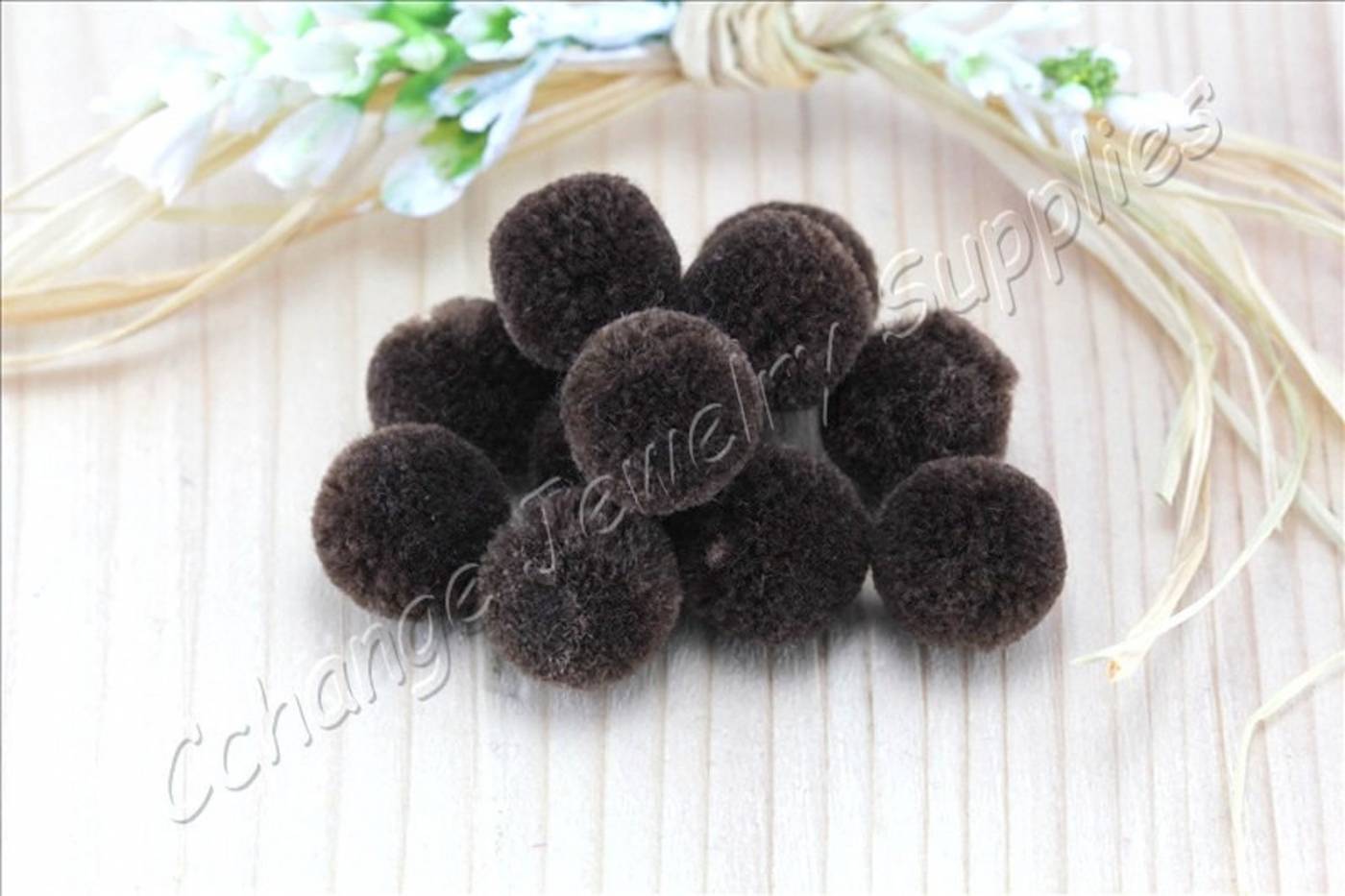 handmade-cotton-pompoms-dark-brown