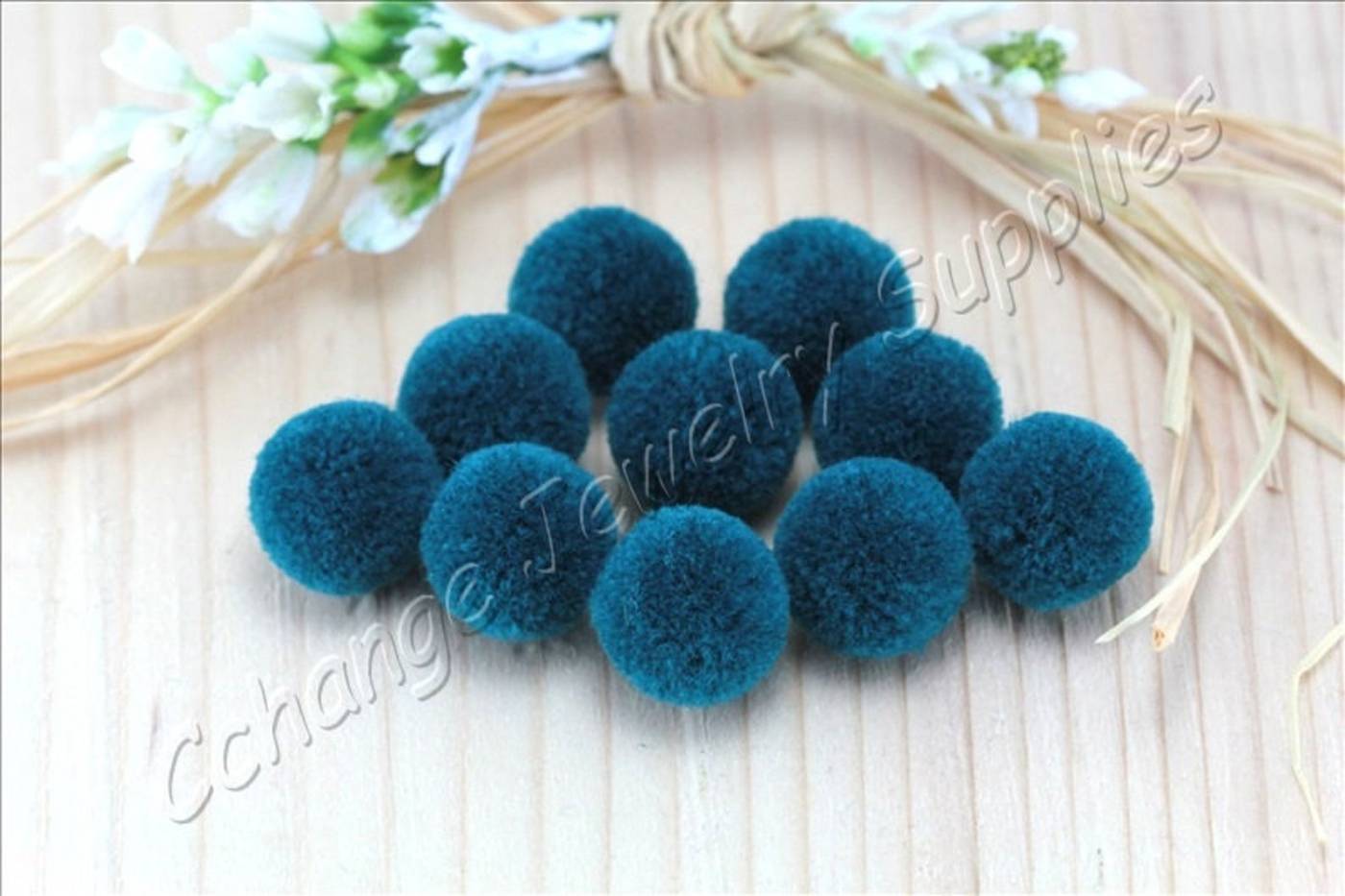 handmade-cotton-pompoms-petrol-blue