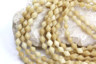 bicone-shape-buri-seed-beads