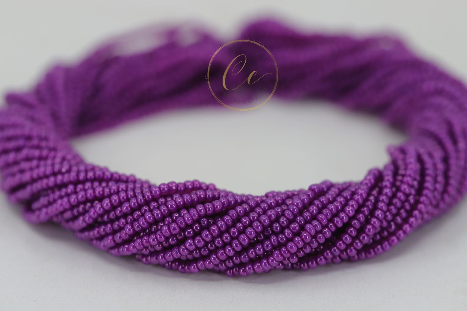 dark-purple-czech-seed-bead-17125