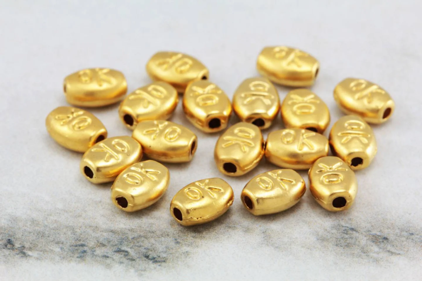 matte-gold-plated-oval-spacer-beads.