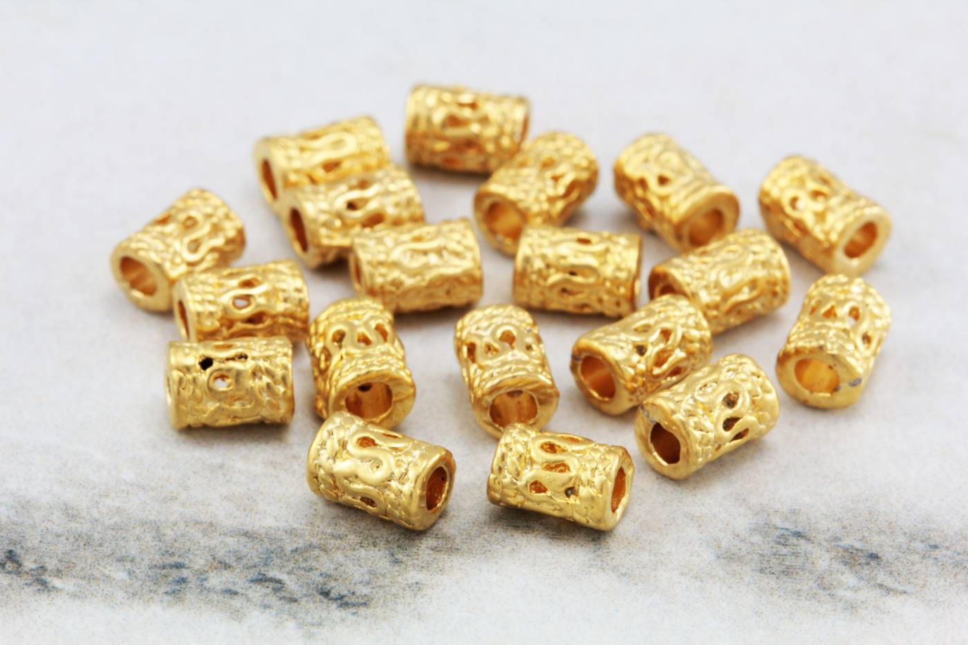 mini-gold-tube-filigree-spacer-beads