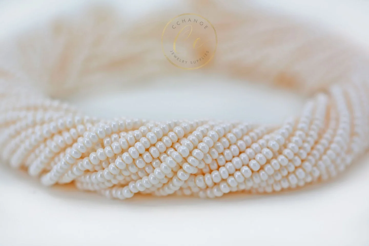 cream-pink-czech-seed-beads-16218.