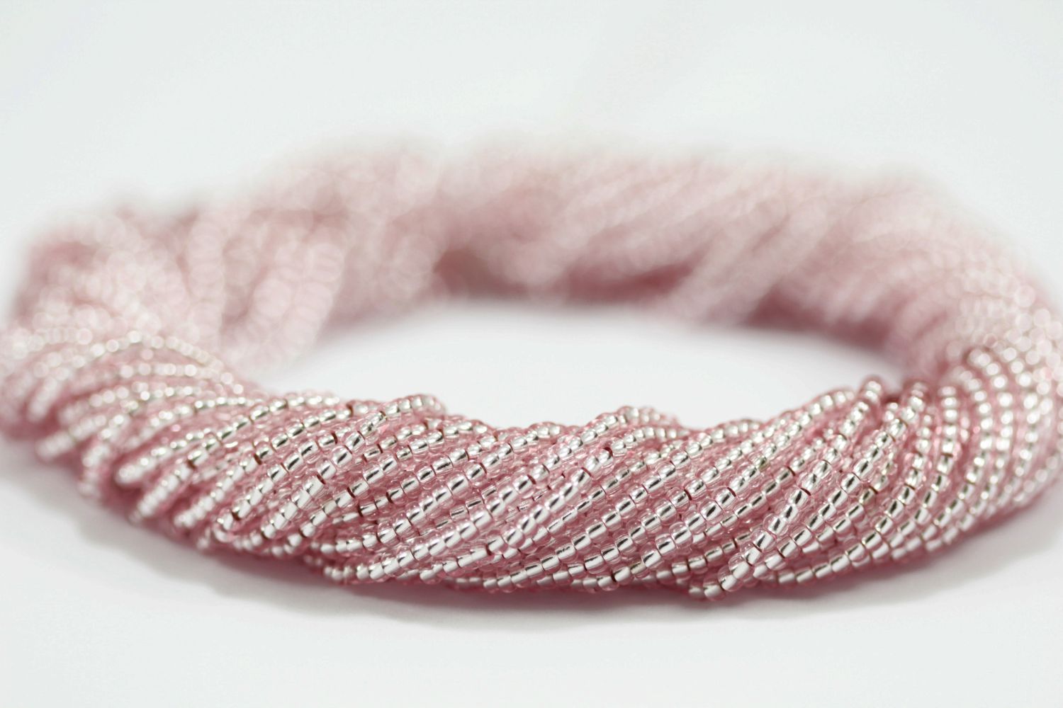 transparent-pink-seed-bead-hank