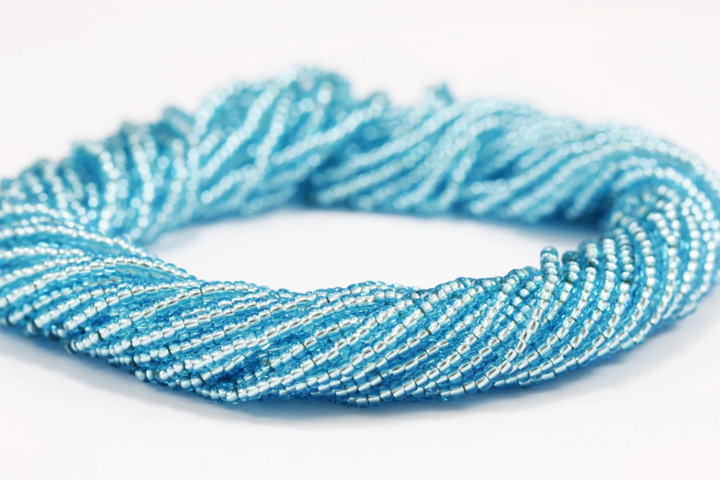 transparent-blue-seed-bead-hank.