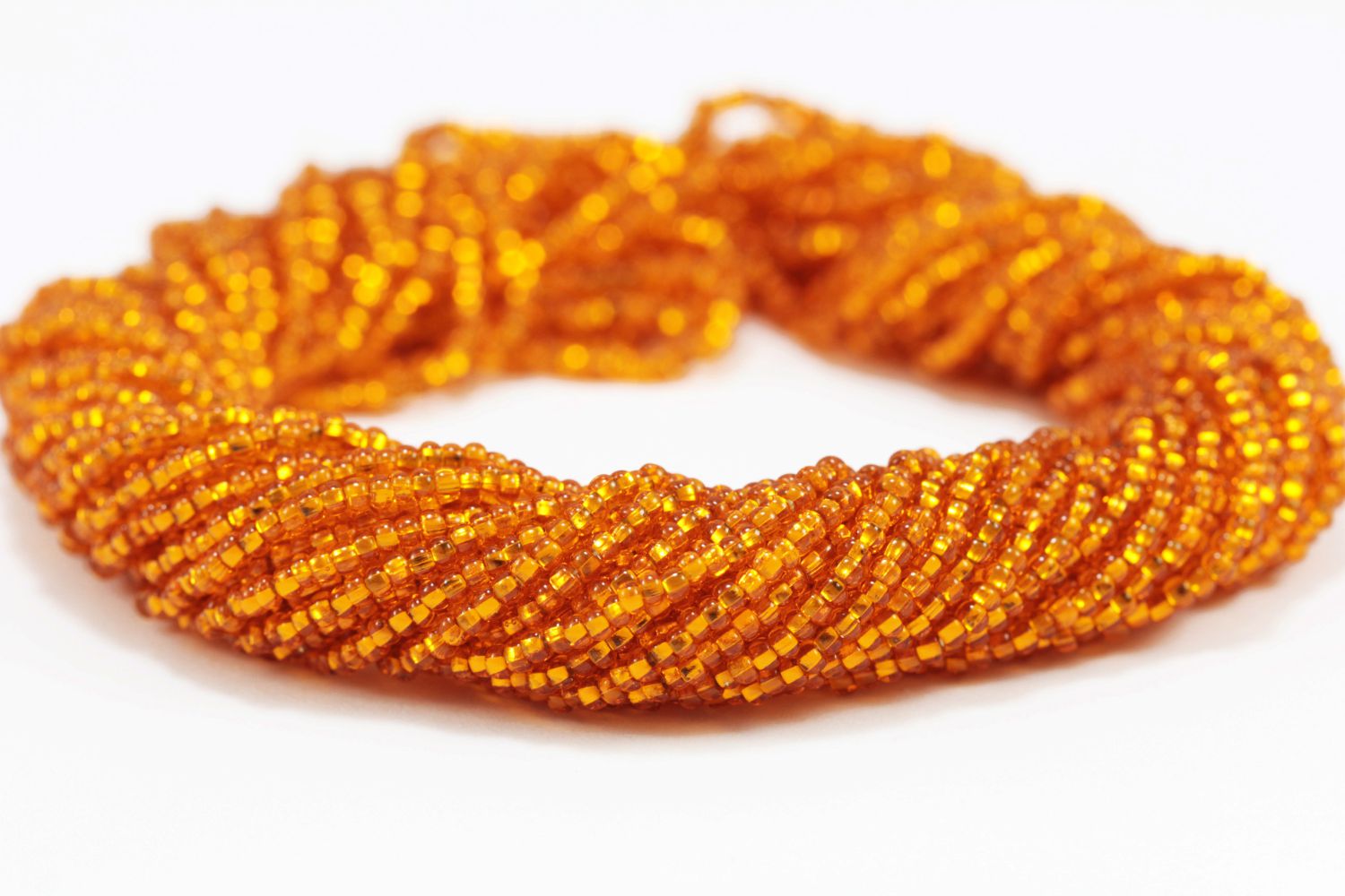 transparent-orange-square-hole-seed-bead