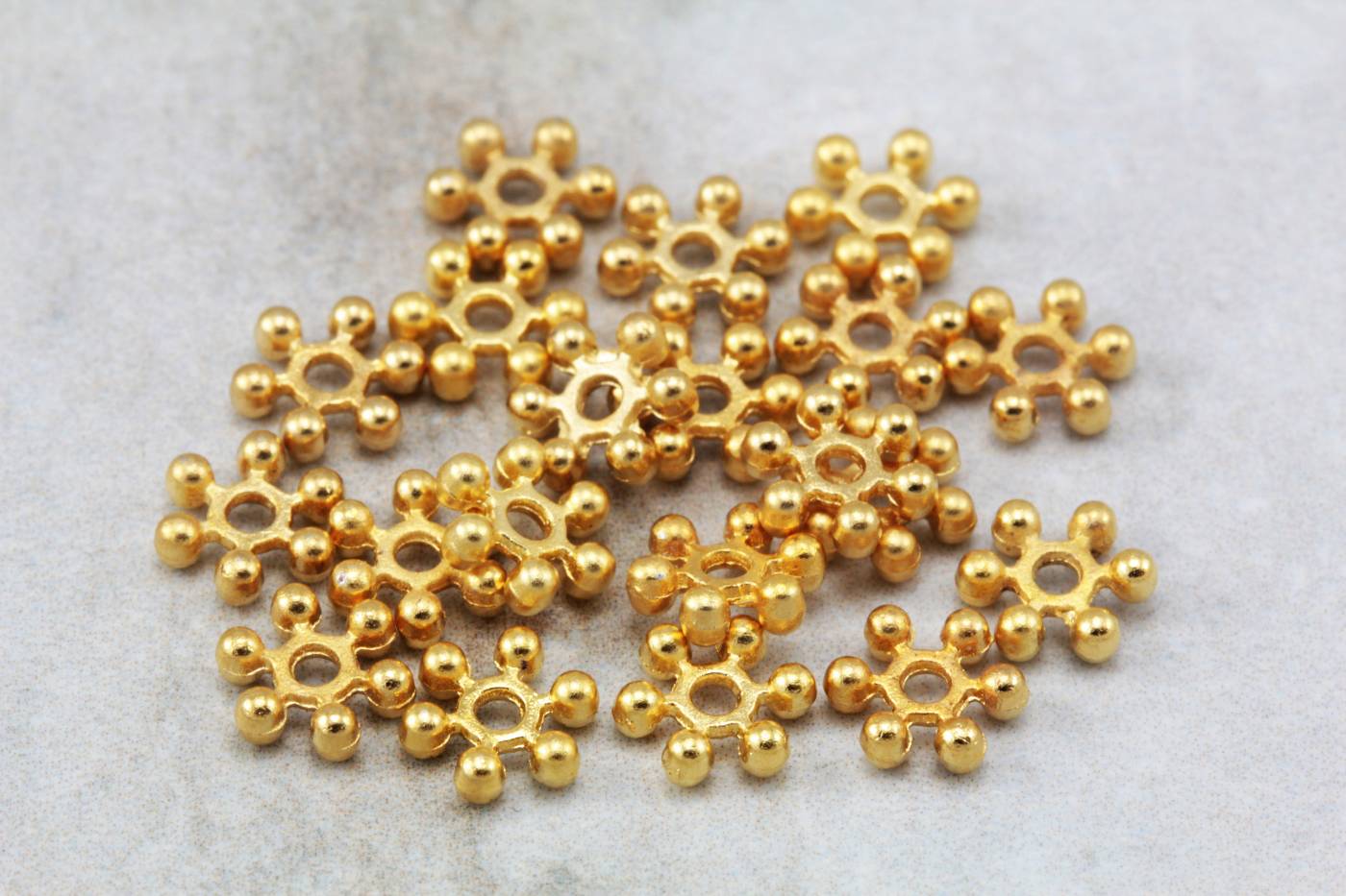 gold-snowflake-shape-rondell-spacer-bead