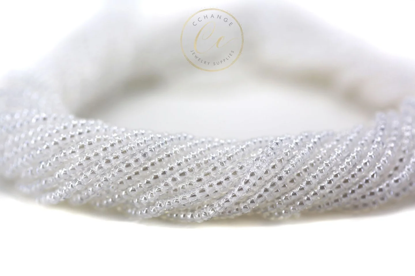 transparent-white-czech-seed-bead-48102.