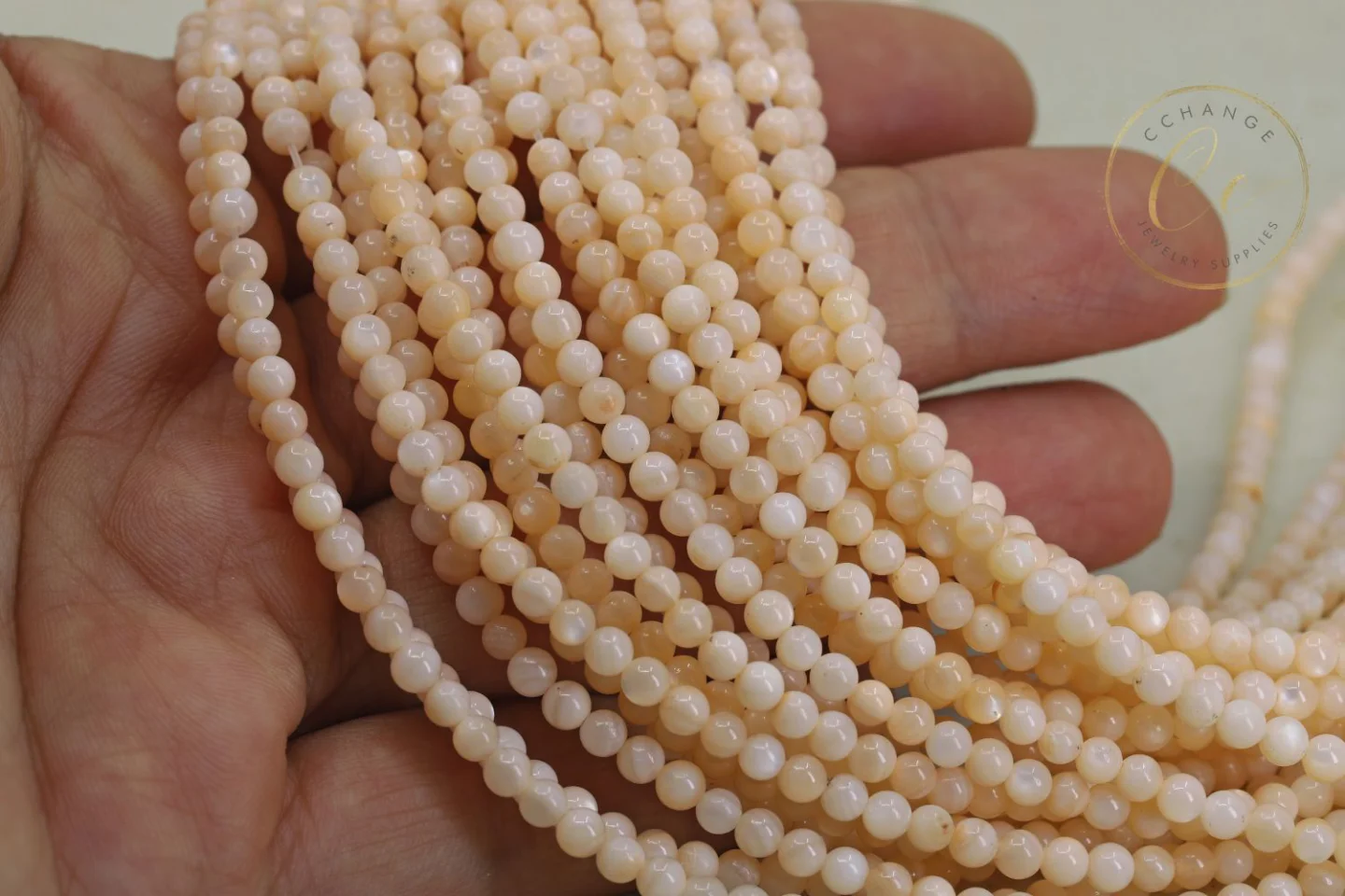 peach-orange-shell-round-beads.