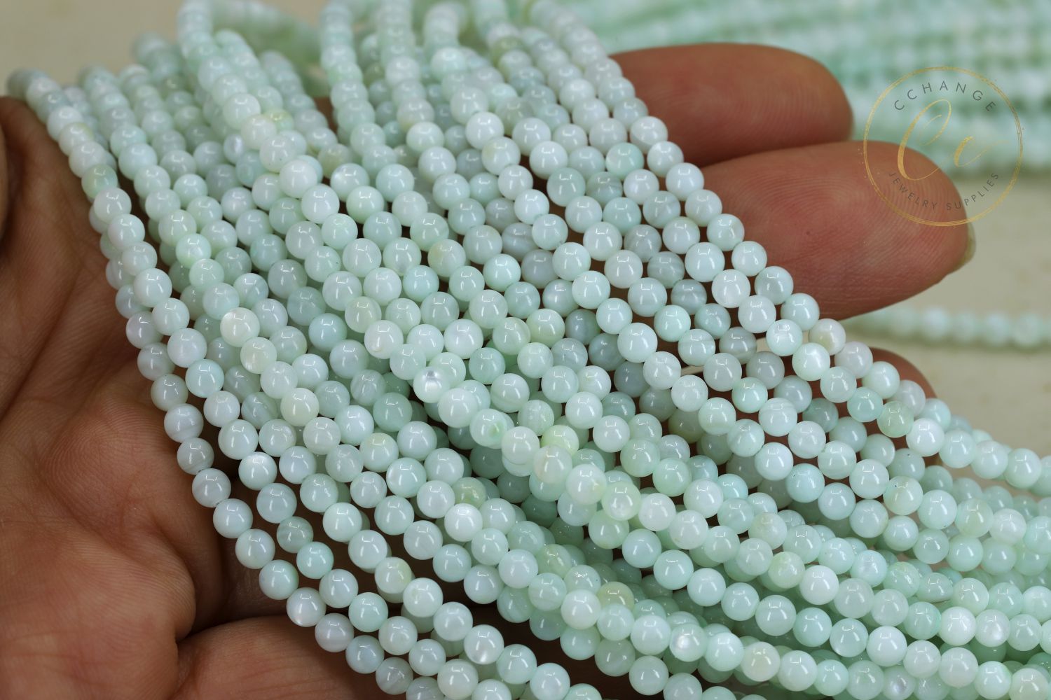 mini-mint-green-shell-round-beads
