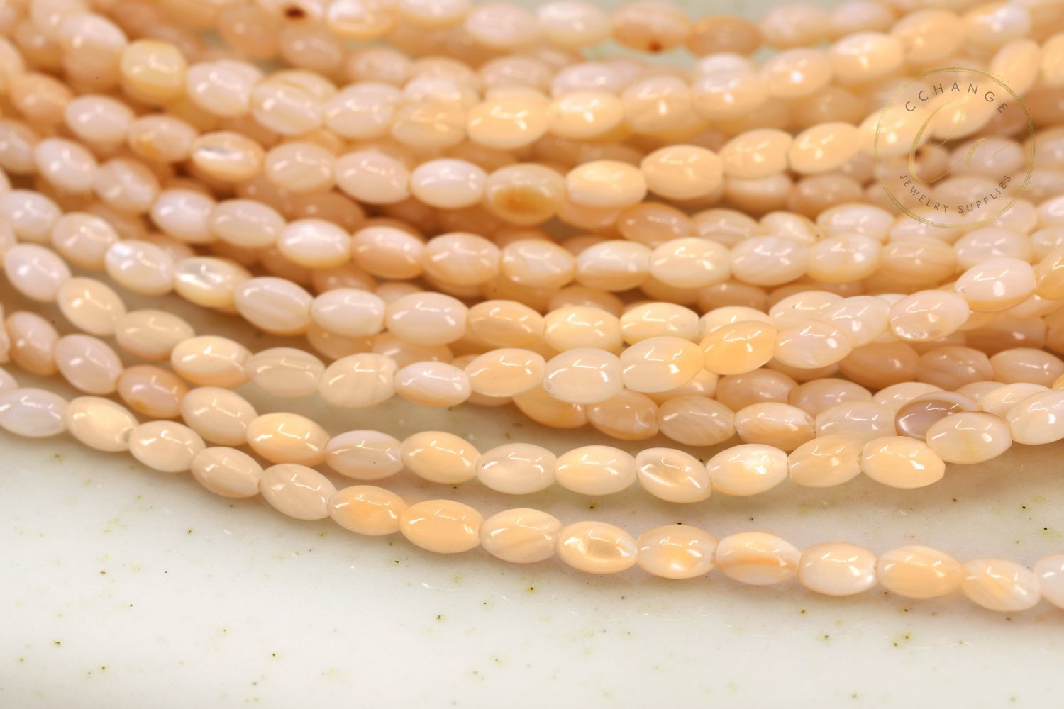 peach-orange-rice-shell-mop-beads