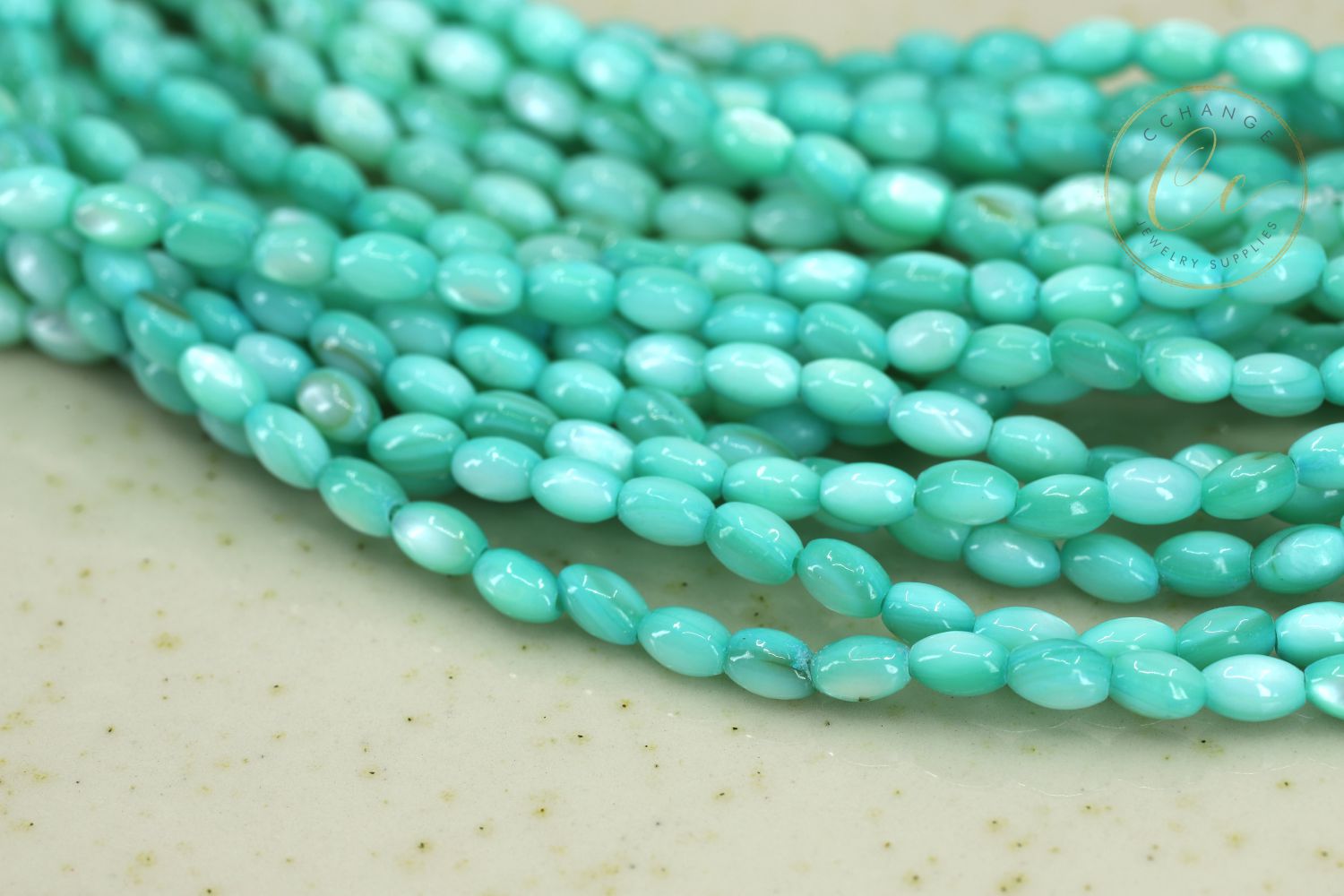 3mm-green-rice-shell-mop-beads
