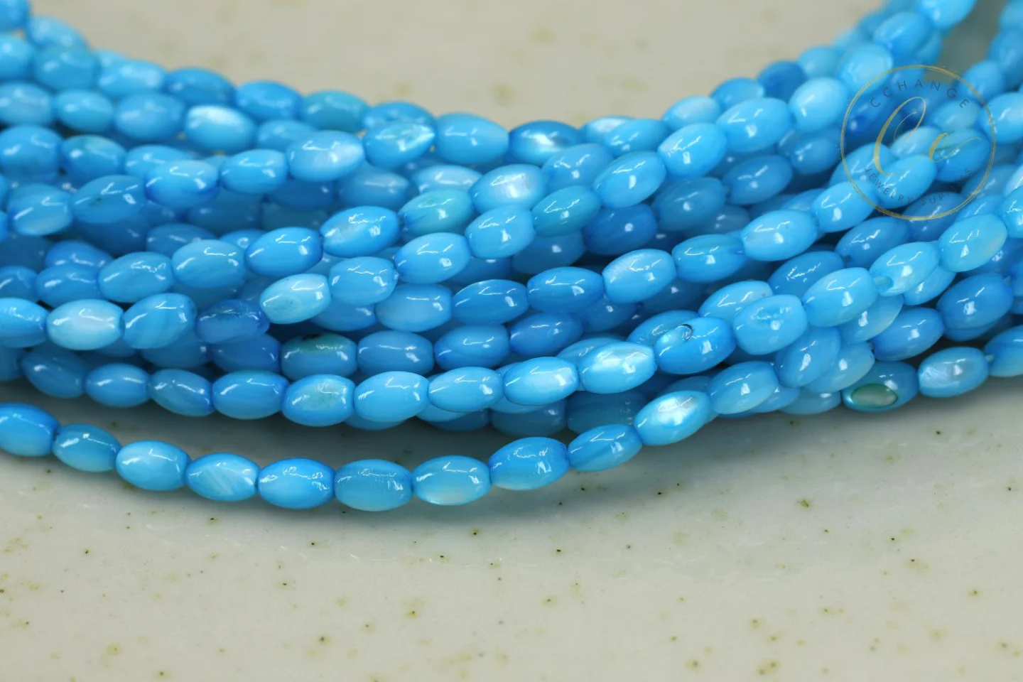 3mm-blue-rice-shell-mop-beads.