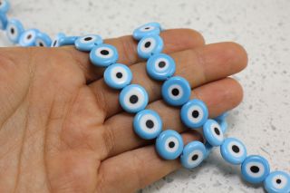 flat-round-evil-eye-beads-strand