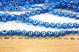 flat-round-evil-eye-beads-strand