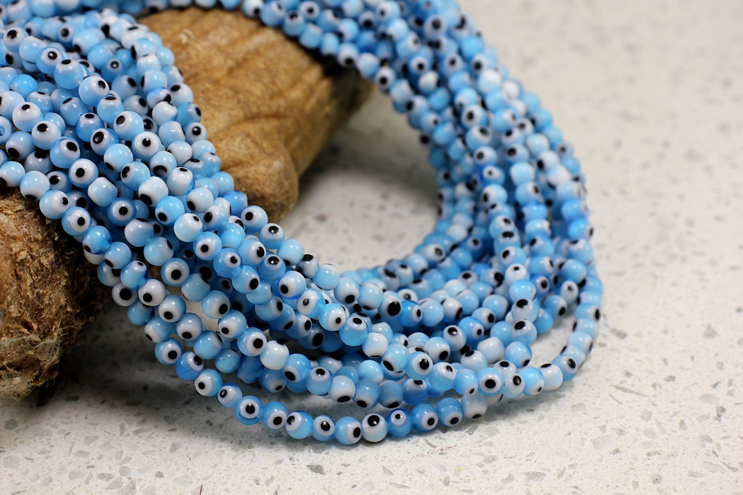 4mm-blue-glass-round-evil-eye-beads