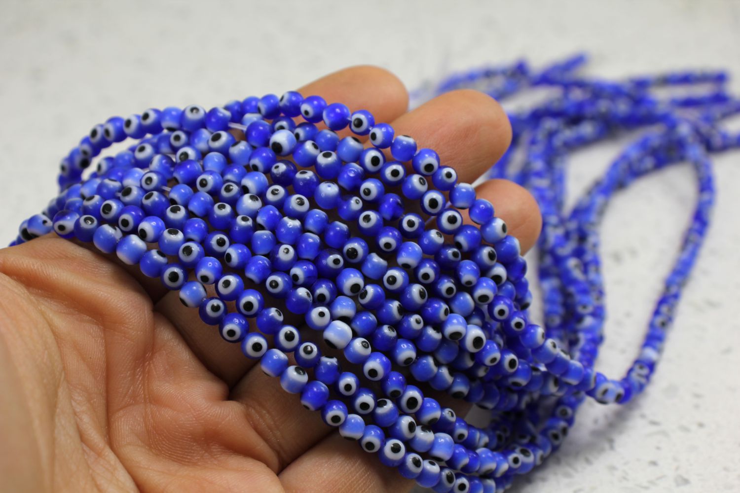 4mm-dark-blue-glass-round-evil-eye-bead