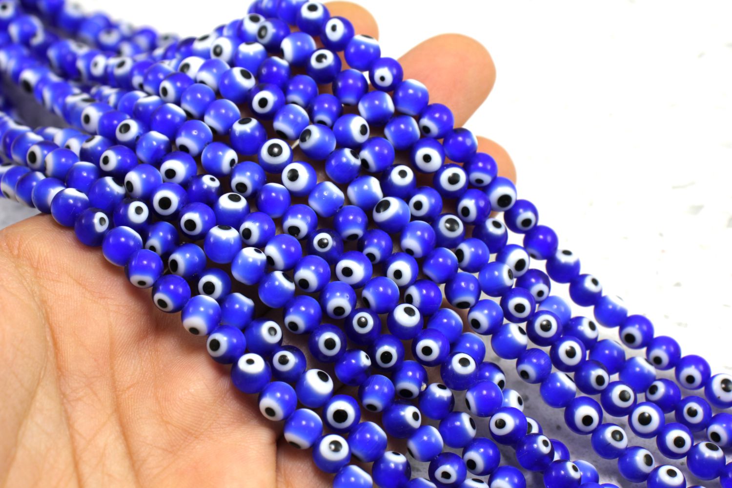 6mm-dark-blue-glass-round-evil-eye-bead