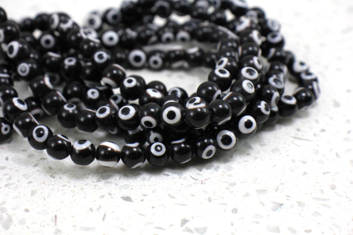 6mm-black-glass-evil-eye-beads