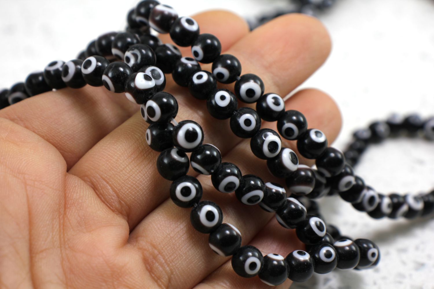 6mm-black-glass-round-evil-eye-beads