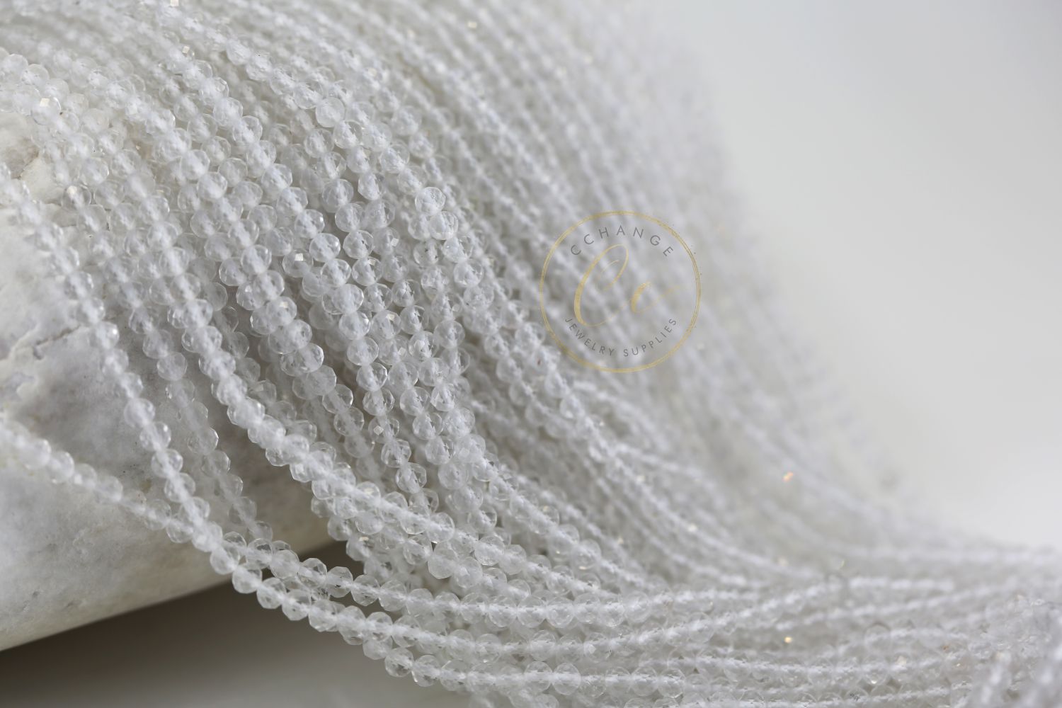 clear-quartz-faceted-round-beads