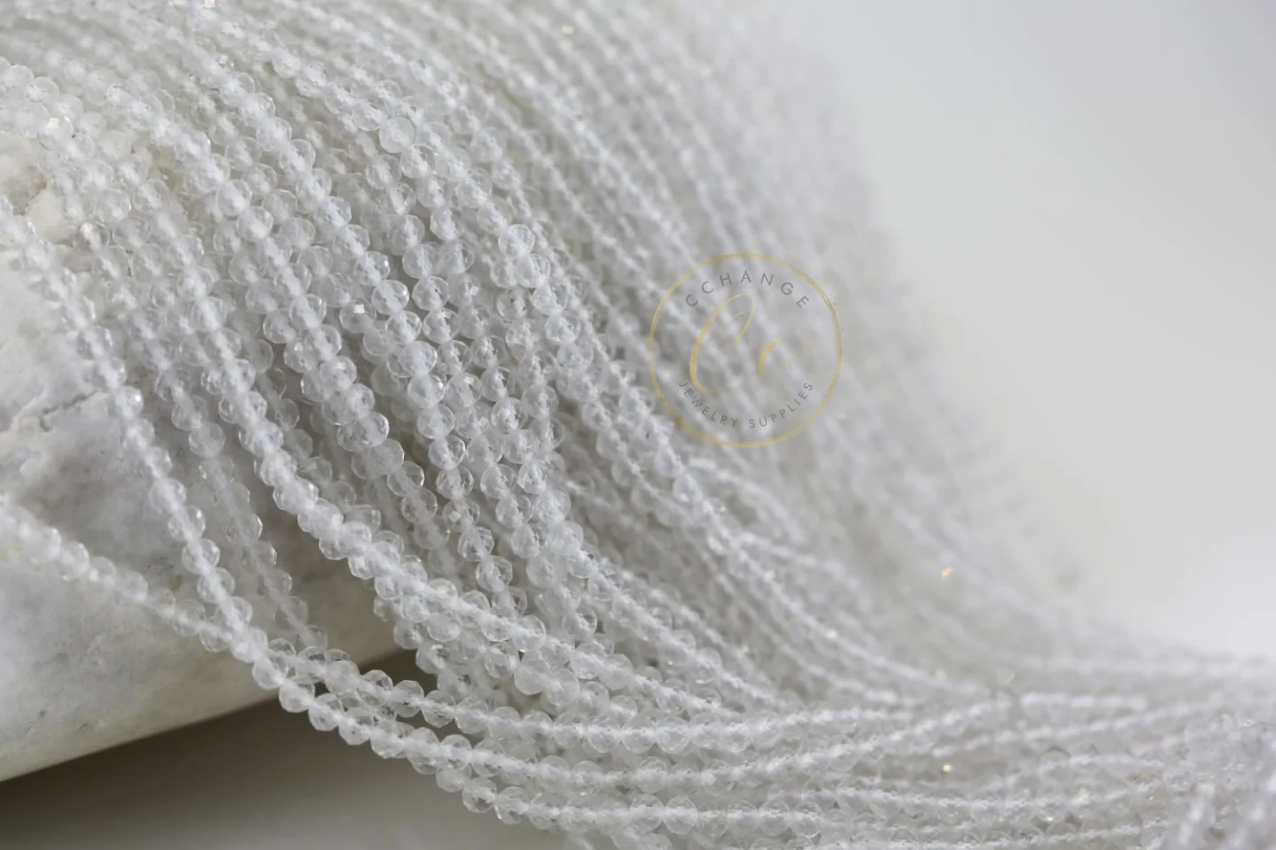 clear-quartz-faceted-round-beads.