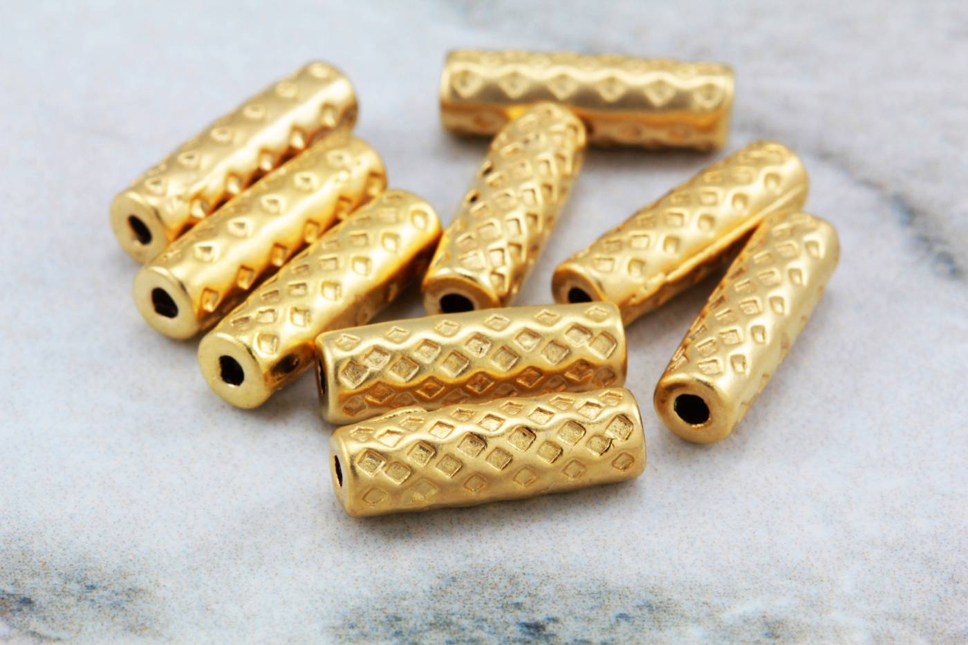 gold-textured-metal-tube-spacer-beads