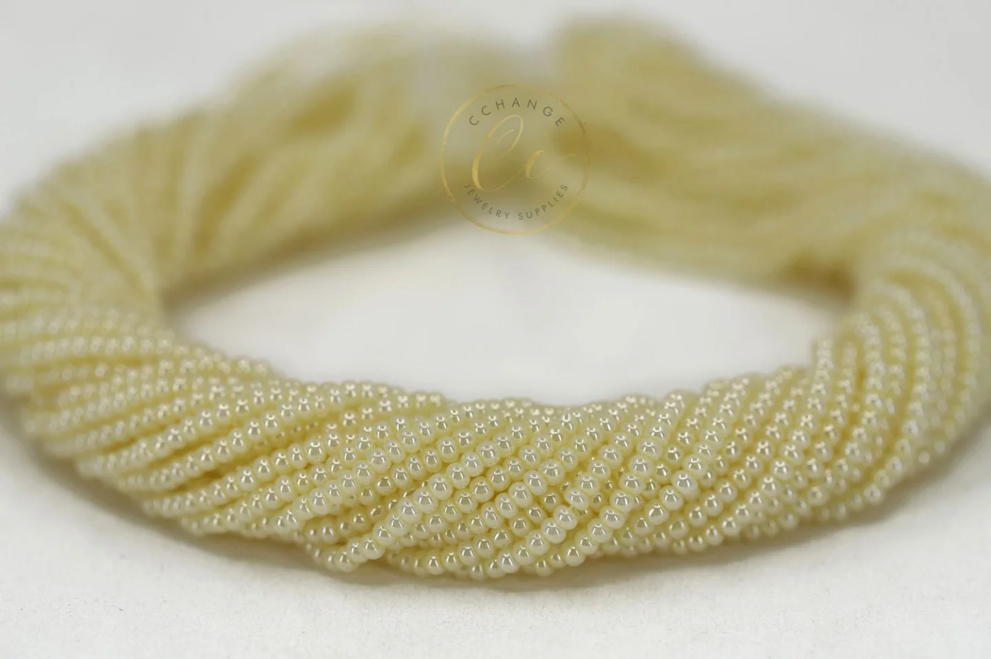 shiny-eggshell-seed-bead-47113.