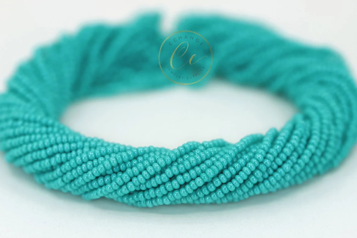bright-turquoise-seed-bead-16158.