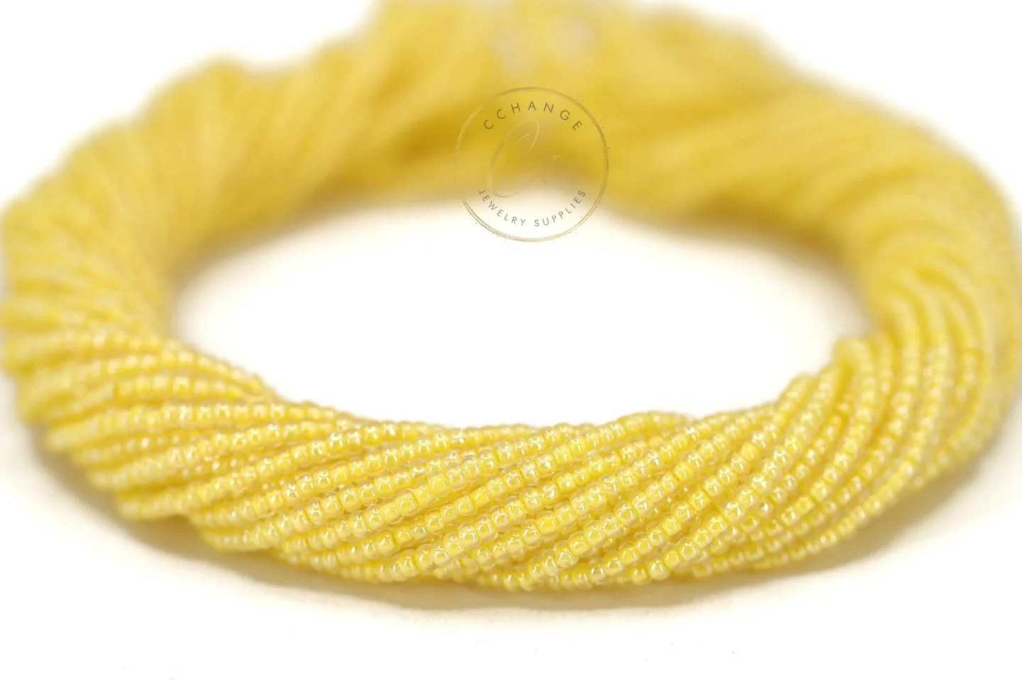 Yellow-line-transparent-seed-bead-38686.