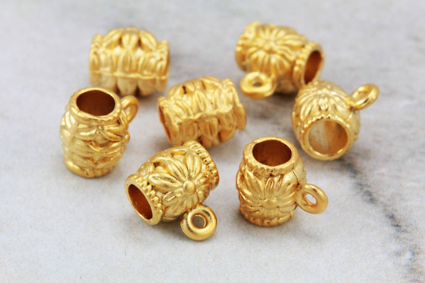 gold-barrel-link-charm-flower-pattern
