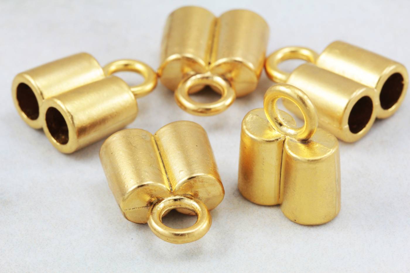 gold-plated-metal-double-hole-end-caps