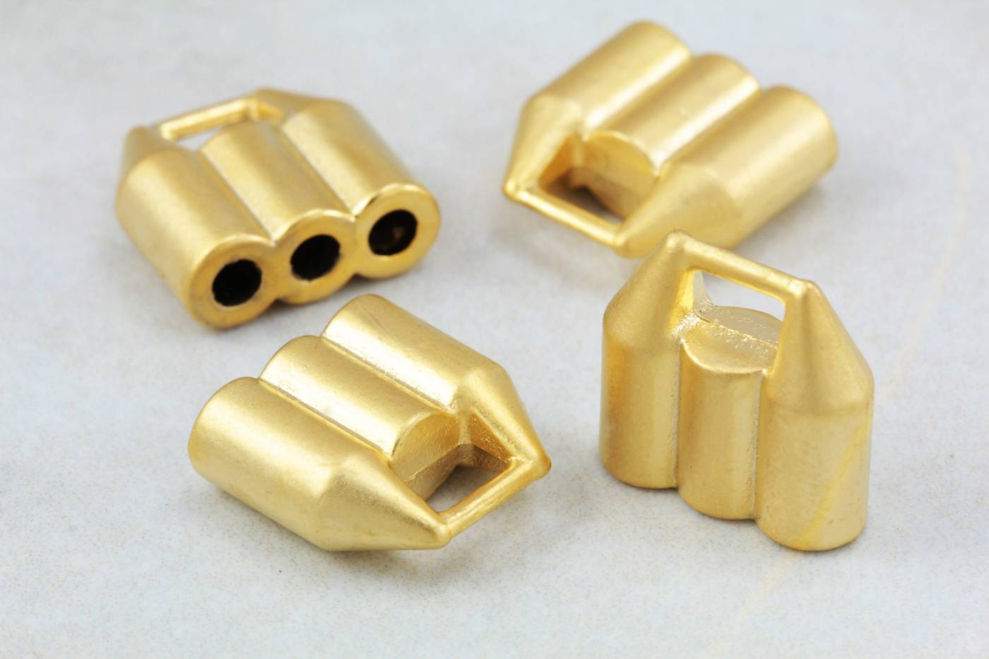 gold-metal-triple-holes-round-end-caps