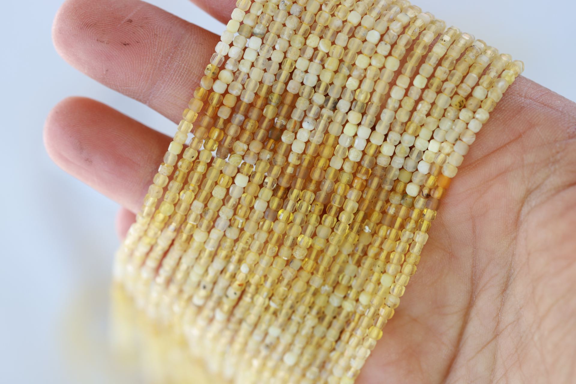 2mm-cube-faceted-yellow-opal-beads