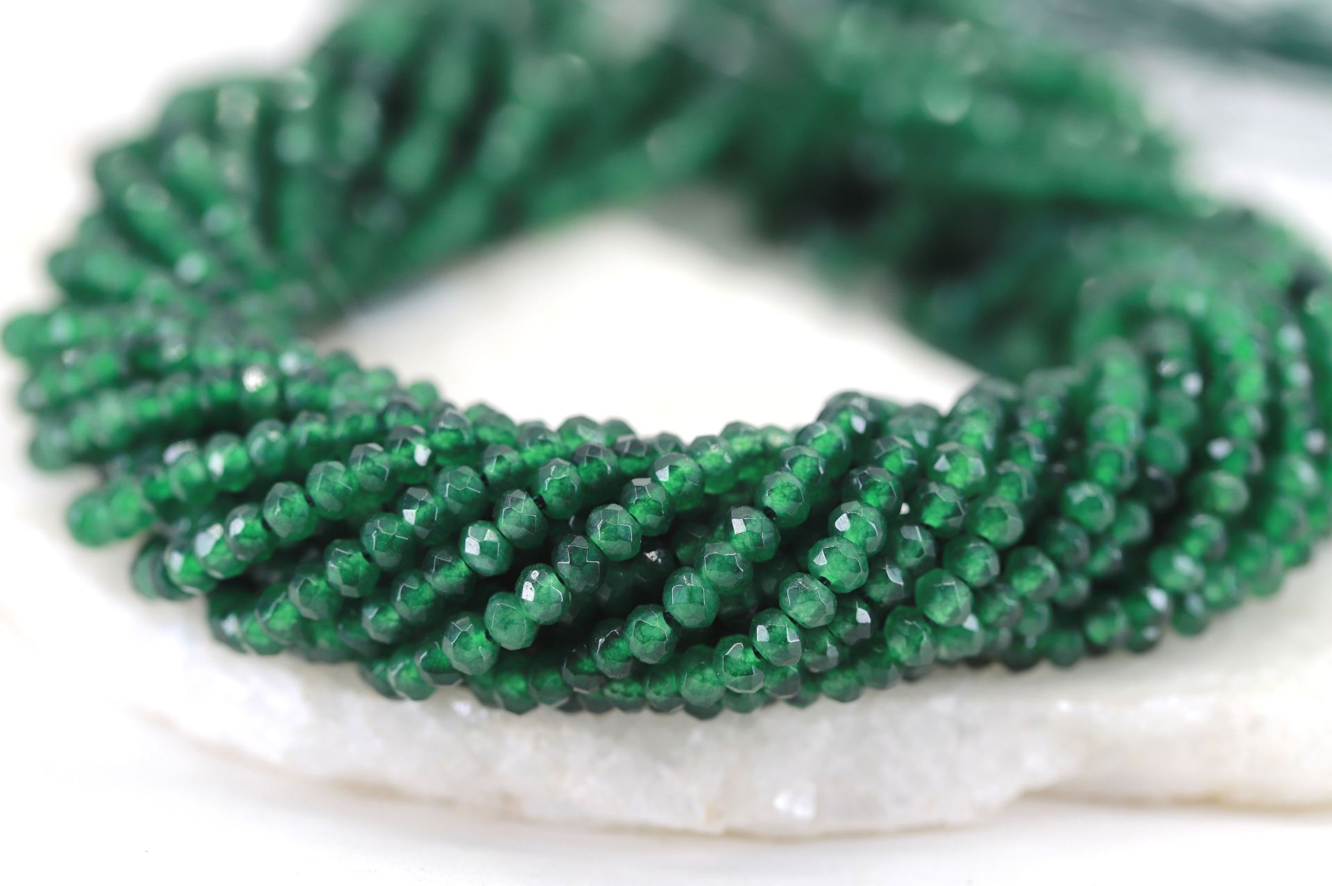 4mm-emerald-green-faceted-rondelle-beads