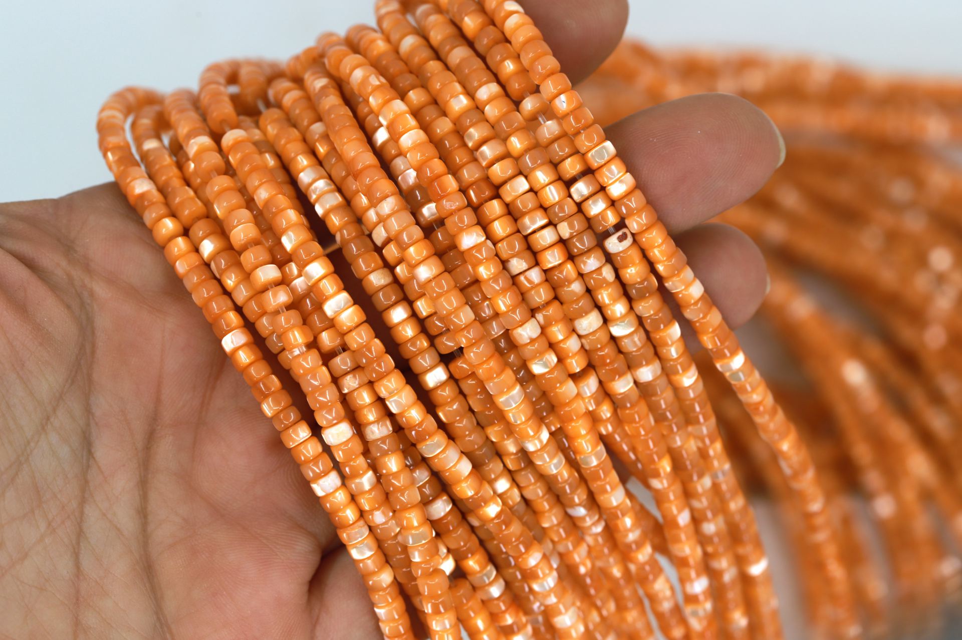 4mm-orange-rondelle-shell-beads