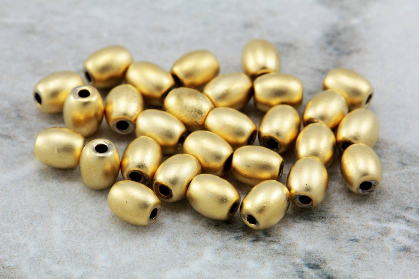 gold-plated-metal-mini-oval-spacer-beads