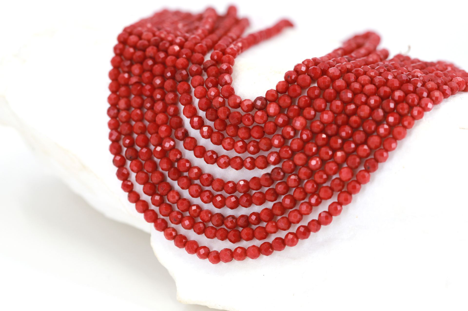 3mm-round-faceted-coral-stones